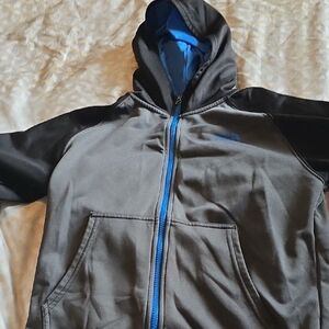 The North Face Gray and Blue Puffer Jacket with Modern Style